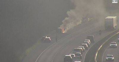 Car catches fire on M4 causing delays