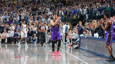 Lakers' Luka Doncic wipes away tears, then whips Mavs in return - ESPN - espn.com