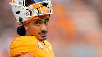 QB Nico Iamaleava skips Vols practice amid NIL talks, sources say - ESPN