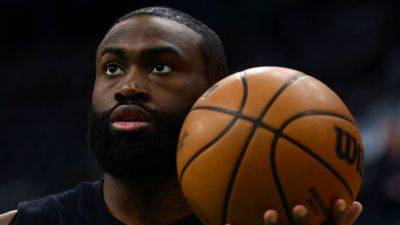 Orlando Magic - Kristaps Porzingis - Jaylen Brown - Celtics' Jaylen Brown got painkilling shot in knee, sources say - ESPN - espn.com - New York