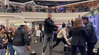 Tom Brady flashes legendary arm for fans at grand opening of new store; discusses Joe Montana, Super Bowl win