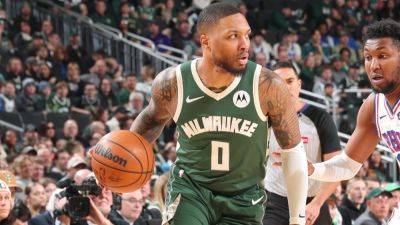 Bucks' Damian Lillard to miss start of NBA playoffs, sources say - ESPN