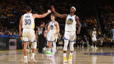 Butler, Curry lead Warriors past Grizzlies, into playoffs - ESPN