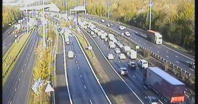 Huge M60 queues following crash on M56 - manchestereveningnews.co.uk - county Island - county Denton