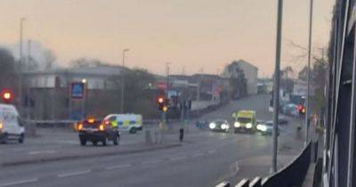 LIVE: Police tape off busy road next to Aldi supermarket - updates