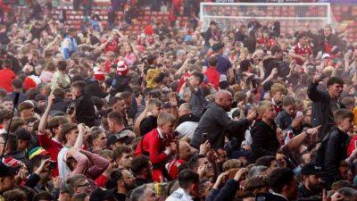 Ryan Reynolds - Rob Macelhenney - Paul Mullin - Phil Parkinson - Sam Smith - Wrexham promoted to Championship as historic rise continues - ESPN - espn.com - Britain