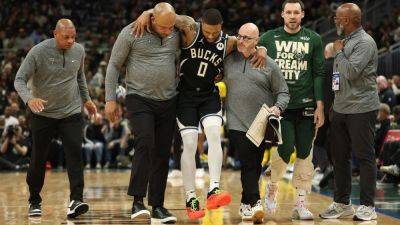 Damian Lillard - An Mri - Sources - Bucks' Damian Lillard has torn left Achilles tendon - ESPN - espn.com - county Bucks - state Indiana