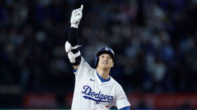 Shohei Ohtani's walk-off blast pushes Dodgers to historic 8-0 - ESPN