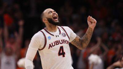 Auburn's Johni Broome has 'no limitations' with injured elbow - ESPN