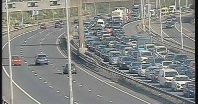 M60 LIVE as traffic held with major delays after crash - updates