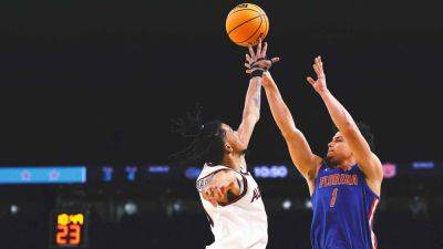 Welcome to Walter's World! Walter Clayton leads Florida into title game