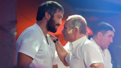 Vladimir Putin congratulates Alex Ovechkin on goal-scoring record - ESPN