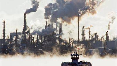 Oil prices tumble to four-year low as US-China trade war fuels recession fears