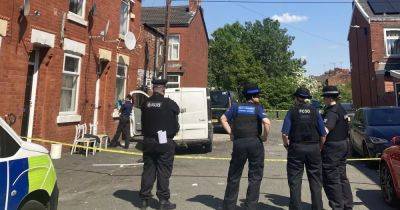 LIVE: Police issue statement after cordoning off Manchester road - updates