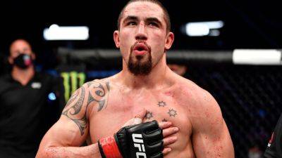 Ex-champ Robert Whittaker to face Reinier de Ridder in July - ESPN