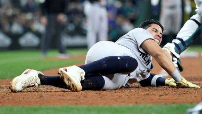 Yankees' Oswaldo Cabrera taken off in ambulance after slide - ESPN