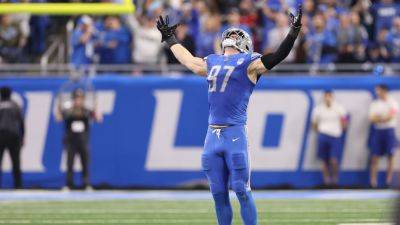Lions' Aidan Hutchinson cleared to return to football activities - ESPN