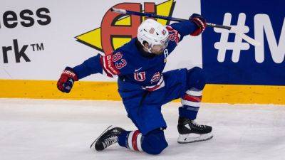 Nathan Mackinnon - Nikolaj Ehlers - Canada loses, U.S. reaches semifinals at ice hockey worlds - ESPN - espn.com - Sweden - Denmark - Switzerland - Canada - state Indiana - county Travis - county Crosby