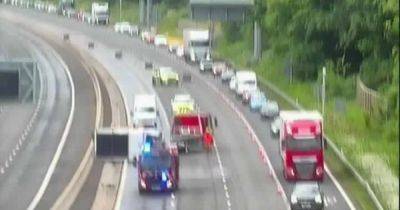 M6 traffic LIVE updates as THREE lanes shut after trailer overturns
