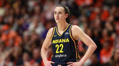 Fever's Caitlin Clark out at least 2 weeks with quad strain - ESPN