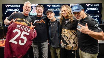 Metallica rocks Virginia Tech's stadium with football entrance song - ESPN - espn.com - county Lane