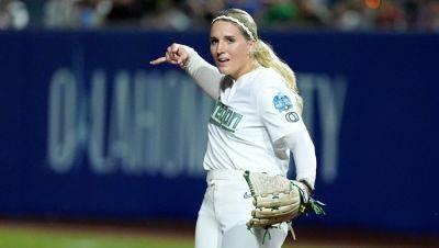 One In A Million Shot As Softball Pitcher Hits Clump Of Dirt In Mid-Air, Nearly Blinds Catcher