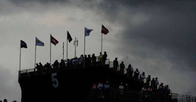 Heavy rain halts play at US Open with overnight leader Sam Burns still ahead