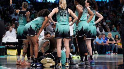 Liberty's Jonquel Jones reinjures right ankle in loss to Mercury - ESPN