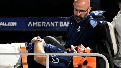 Kevin Cash - Rays pitcher carted off field after foul ball strikes him in dugout - ESPN - espn.com - county Bay