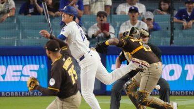 MLB suspends Padres' Suarez, Shildt, Dodgers' Roberts - ESPN