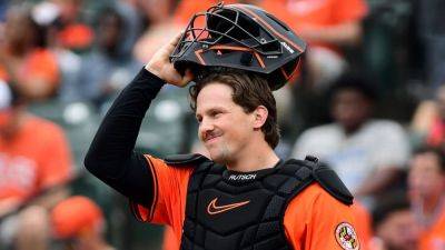 Orioles' Rutschman out through break, Handley hurt in collision - ESPN