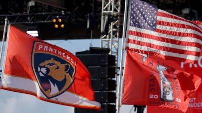 Drier than last year's parade, proud Panthers party at beach - ESPN