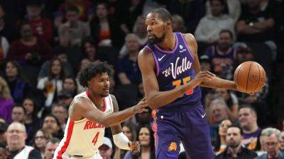 Kevin Durant traded to Rockets: Grades, reaction, Suns' next steps - ESPN