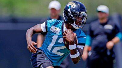 Travis Hunter signs 4-year, $46.65M deal with Jaguars - ESPN