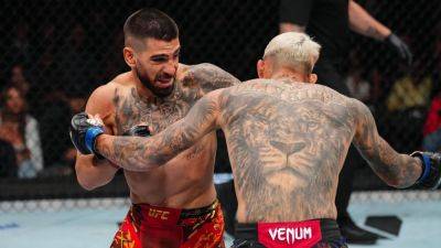 Ilia Topuria KO's Charles Oliveira for vacant title at UFC 317 - ESPN