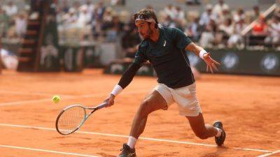 Paris Olympics - Lorenzo Musetti - Lorenzo Musetti warned for kicking ball at French Open line judge - ESPN - espn.com - France - Italy