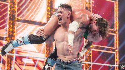 Seth Rollins - John Cena - Cody Rhodes - WWE star John Cena sends referee flying during Night of Champions match - foxnews.com - Saudi Arabia - county King And Queen