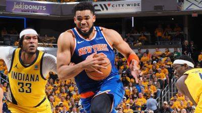 Sources - Karl-Anthony Towns treated for knee, finger injuries - ESPN