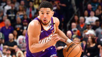 Devin Booker agrees to 2-year, $145M max extension with Suns - ESPN