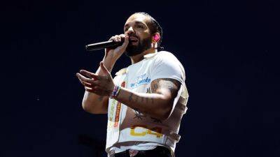 Drake covers up LeBron James tattoo with Shai Gilgeous-Alexander art - ESPN