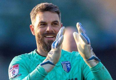Gillingham goalkeeper Glenn Morris reacts to their 2-0 home loss against Luton Town in pre-season friendly