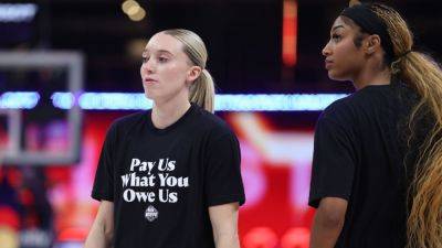 Star Game - Star Weekend - Breanna Stewart - Cathy Engelbert - Napheesa Collier - WNBA All-Stars wear 'Pay Us What You Owe Us' warmup shirts - ESPN - espn.com