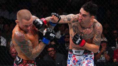 Dustin Poirier - Max Holloway - Live results, analysis from UFC 318: Poirier vs. Holloway 3 - ESPN - espn.com