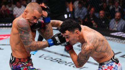 Holloway wins UFC 318 main event in Poirier's retirement fight - ESPN