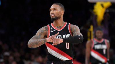 Damian Lillard glad to be 'back home' with Blazers, focuses on recovery - ESPN