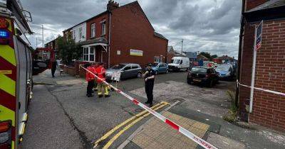 Street taped off and homes evacuated after suspected grenade found - latest updates