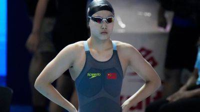 Paris Olympics - China's Yu Zidi, 12, makes debut at world swim championships - ESPN - espn.com - China - Singapore