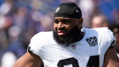 Source - Christian Wilkins' kiss made Raiders player uncomfortable - ESPN