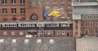 Air ambulance lands in city centre after person falls from car park - latest