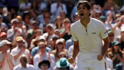 Karen Khachanov - Carlos Alcaraz - Cam Norrie - Taylor Fritz - John Isner - Taylor Fritz wins in 4 sets to reach 1st Wimbledon semifinal - ESPN - espn.com - Britain - Spain - Usa